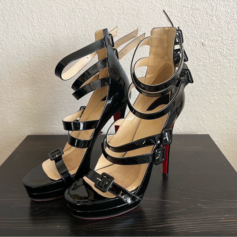 Black strappy Christian Louboutin high heel